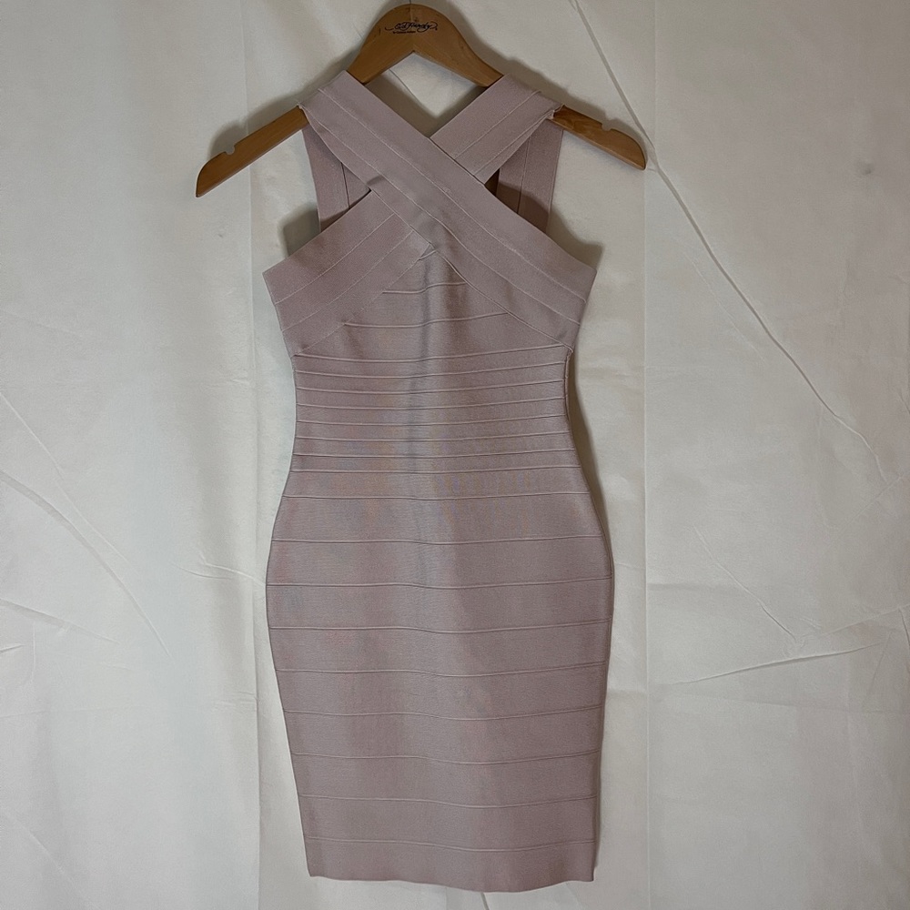This dress is color tan, bandage fabric, wore only once, it is size XS